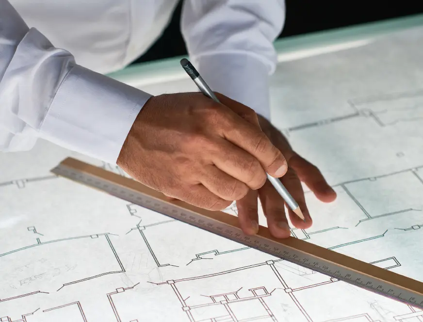 unrecognizable-architect-drawing-plans-2024-01-26-03-07-39-utc